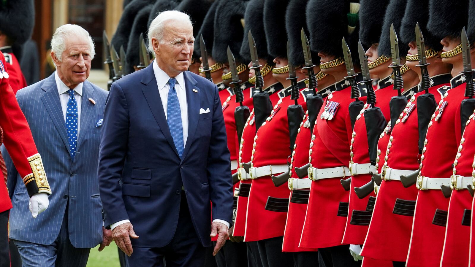 U.S. President Joe Biden participates in a ceremonial arrival and inspection of the honour guard with Britain's King Charles at Windsor Castle in Windsor, Britain.
