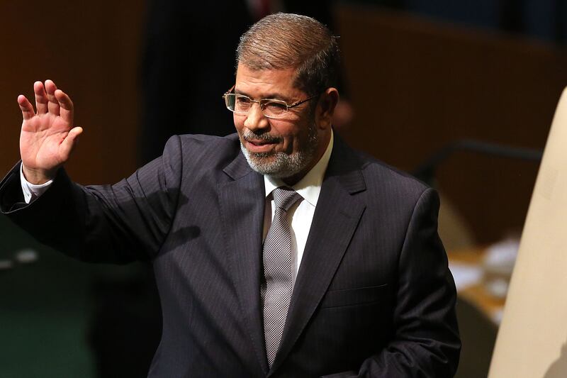 galleries/2012/11/28/obama-s-best-frenemies-john-boehner-bill-clinton-and-more/morsi-obama-frenemies_fpptpo