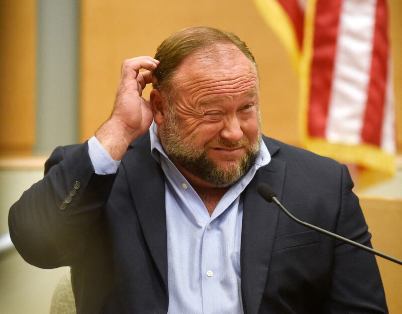 Alex Jones takes the witness stand to testify during the Sandy Hook defamation damages trial in 2022.