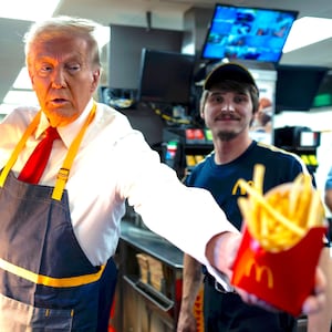 Donald Trump as he works behind the counter during a visit to McDonalds in Feasterville-Trevose, PA, Sunday, Oct. 20, 2024.