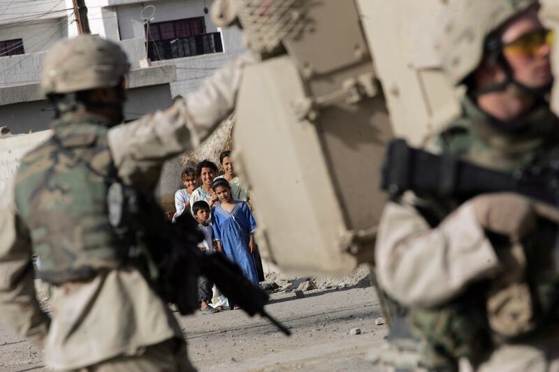 articles/2013/03/19/america-s-lost-decade-in-iraq-a-marine-officer-looks-back/130318-Busch-Iraq-War-tease_oifydf