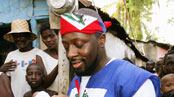 articles/2010/08/04/wyclef-jeans-haitian-presidential-campaign-team/lauria-wyclef_117939_gjyq8i