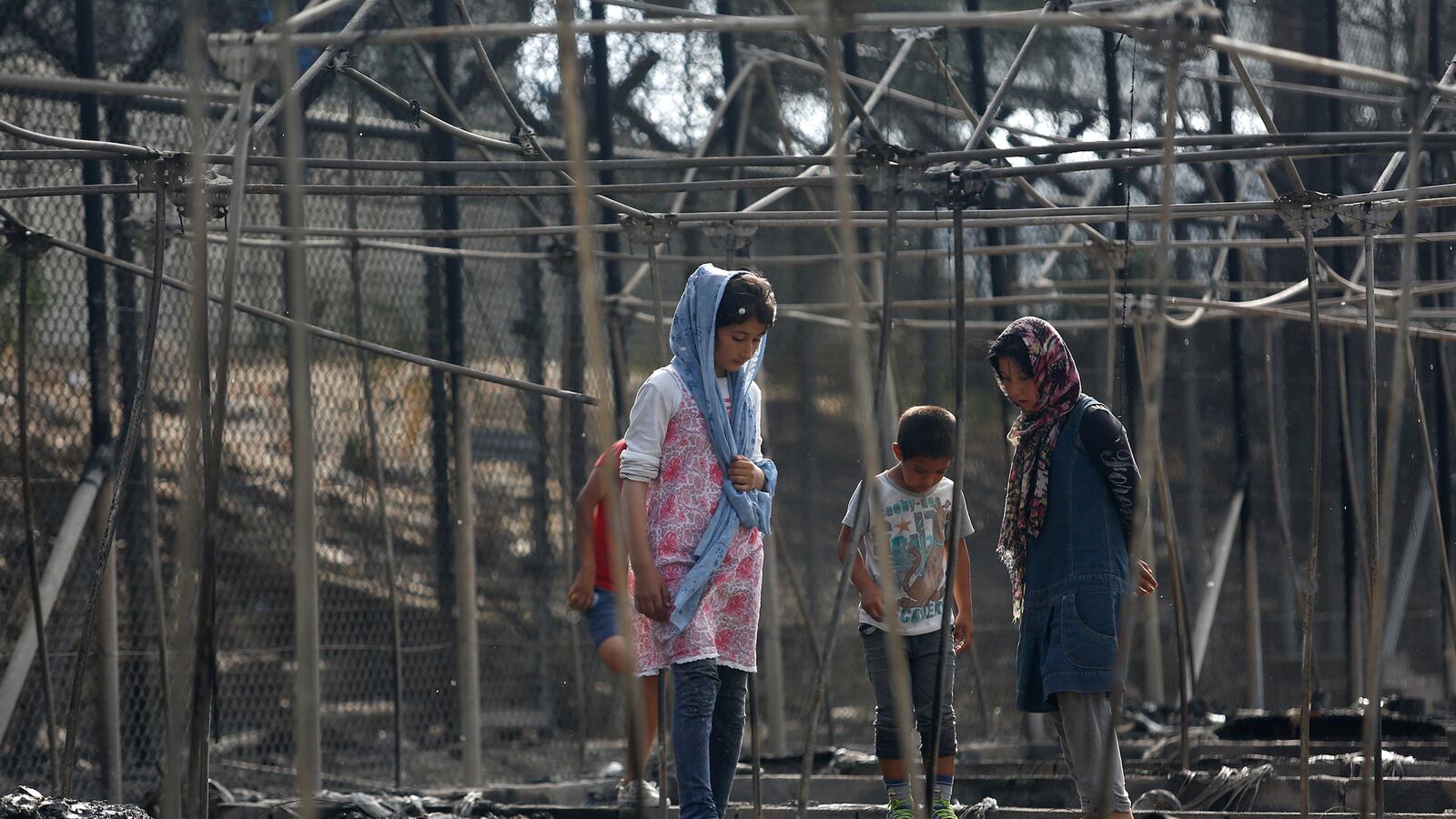 articles/2016/09/20/hellish-greek-refugee-camp-torched/160920-barbie-refugee-camp-fire-tease_gyadyg