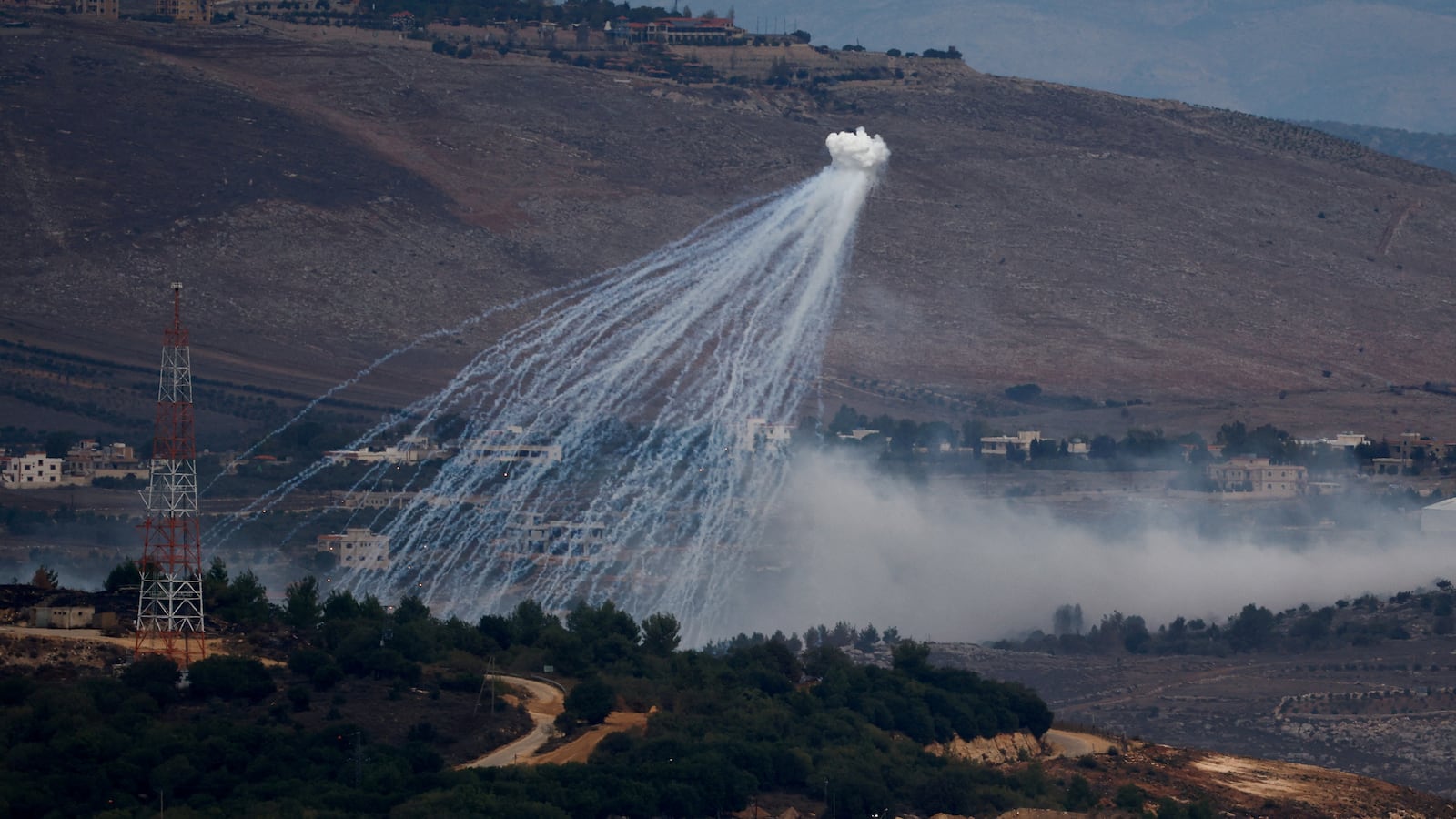 White phosphorus fired by Israeli army to create a smoke screen is seen on the Israel-Lebanon border in northern Israel, Nov. 12, 2023.
