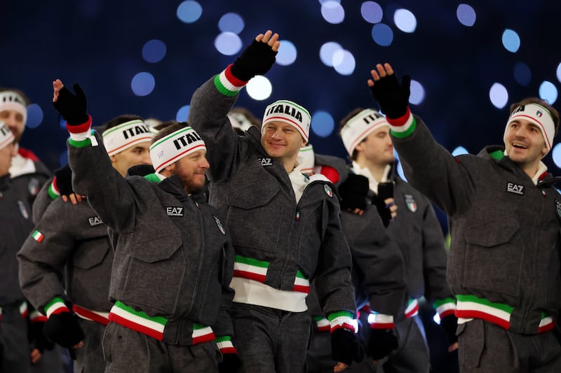 Athletes of Team Italy walk in the athletes' parade.