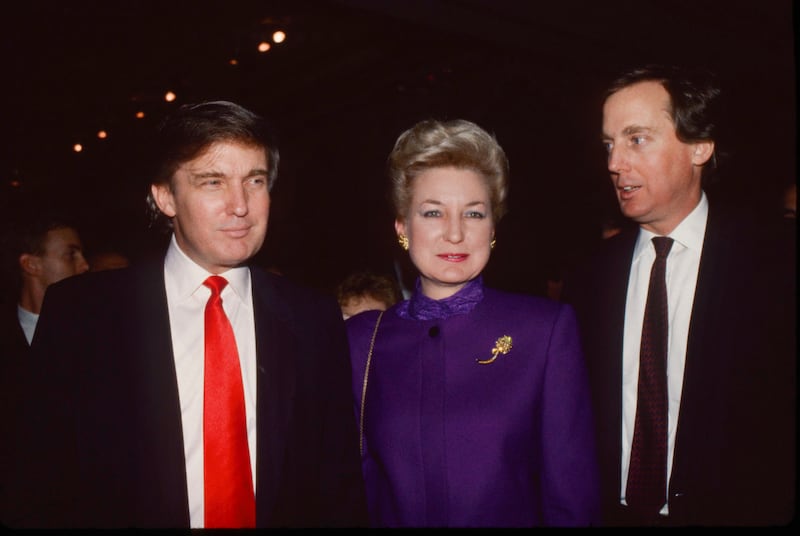Donald Trump with his sister Maryanne Trump Barry and his brother Robert Trump attend the Trump Taj Mahal opening in Atlantic City, New Jersey on April 2, 1990.