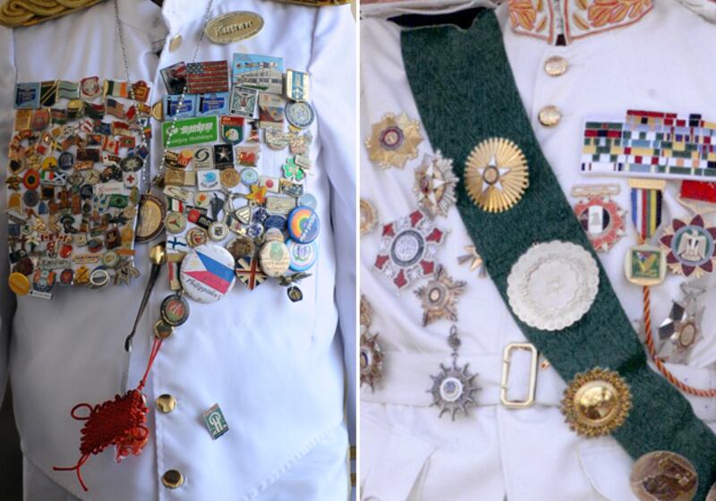 galleries/2011/03/07/gaddafi-or-hotel-doorman/gaddafi-doorman-1-question_a7gwih