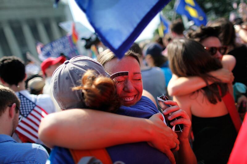 galleries/2013/06/26/gay-day-at-supreme-court-best-photo-reactions/130626-prop8-gallery-two-women-update_stccvh