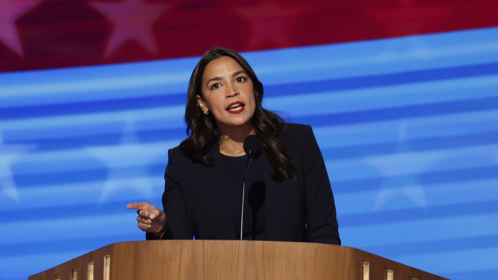 Rep. Alexandria Ocasio-Cortez (D-NY) speaks onstage during the first day of the Democratic National Convention at the United Center on August 19, 2024.