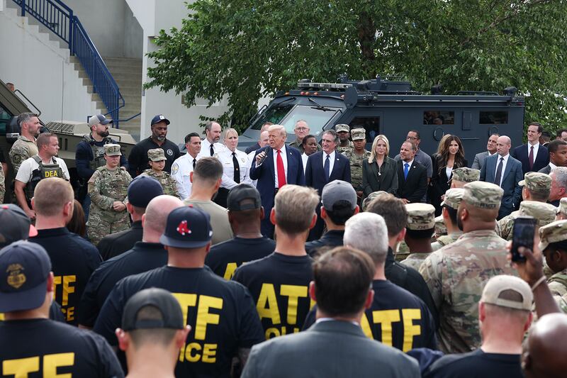 Trump, Doug Burgum, Pam Bondi, Kristi Noem and Stephen Miller visit the U.S. Park Police Anacostia Operations Facility on Thursday.