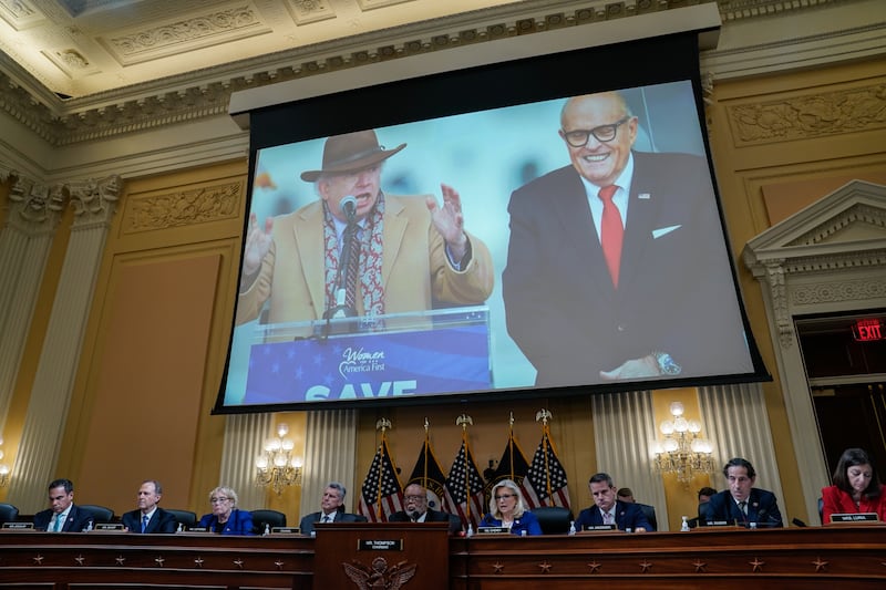 John Eastman and Rudi Giuliani are seen on the screen as the House select committee investigating the Jan. 6 attack on the U.S. Capitol holds a hearing on Capitol Hill on Thursday, October 13, 2022 in Washington, DC.