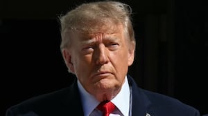 President Donald Trump and First Lady Melania Trump look on before welcoming China's President Xi Jinping and his wife Peng Liyuan for tea at the White House, in Washington, DC, on September 25, 2026.