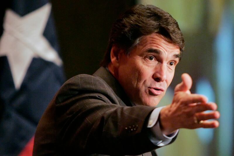 articles/2011/10/05/rick-perry-s-other-hunting-buddies-ted-nugent-lanny-vinson-more/rick-perry-racist-barrett_jq4goj