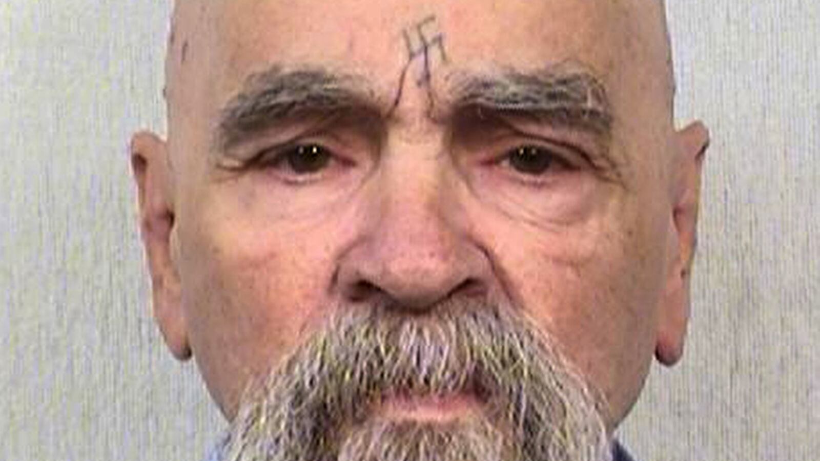 articles/2014/11/18/charles-manson-ted-bundy-other-notorious-jailhouse-weddings/141118-dickson-manson-tease_yh9tid