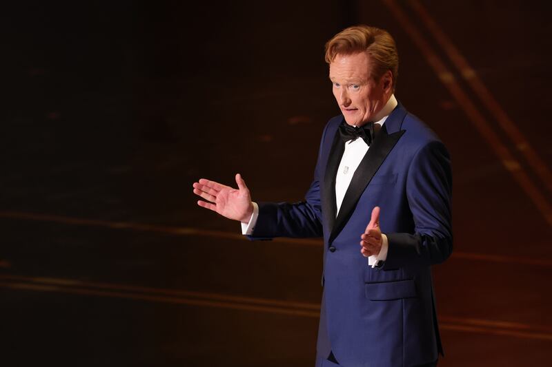 HOLLYWOOD, CALIFORNIA - MARCH 15: Host Conan O'Brien speaks onstage during the 98th Oscars at Dolby Theatre on March 15, 2026 in Hollywood, California. (Photo by Kevin Winter/Getty Images)