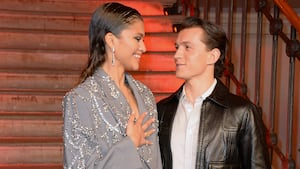 Zendaya and Tom Holland pose at a photocall for "Spider-Man: No Way Home" at The Old Sessions House on December 5, 2021 in London, England.