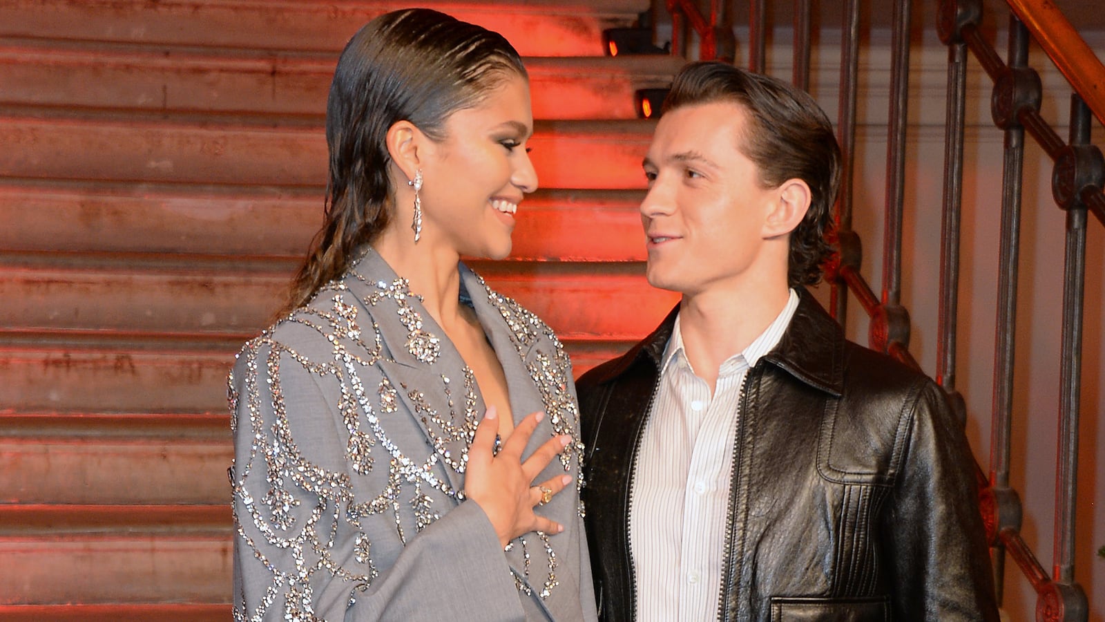 Zendaya and Tom Holland pose at a photocall for "Spider-Man: No Way Home" at The Old Sessions House on December 5, 2021 in London, England.