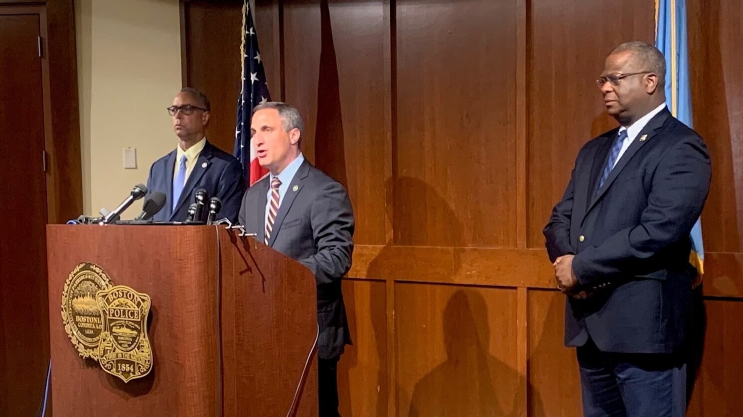 District Attorney Kevin R. Hayden and Boston Police Commissioner Michael Cox listen as Joe Bonavolonta, the Special Agent in Charge of the FBI Boston Division discusses the arrest of Matthew Nilo.