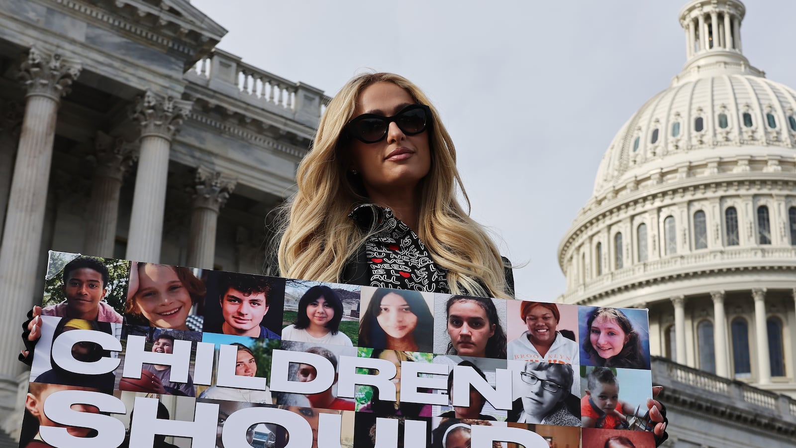WASHINGTON, DC - DECEMBER 17: Celebrity hotel heiress Paris Hilton poses for photographs outside the U.S. Capitol on the day the House of Representatives is set to vote on The Stop Institutional Child Abuse Act on December 17, 2024 in Washington, DC. Citing her own traumatizing experience at Provo Canyon School in Utah when she was a teenager, Hilton has lobbied for three years for the legislations that would place greater federal safeguards on institutional youth treatment programs. (Photo by Chip Somodevilla/Getty Images)