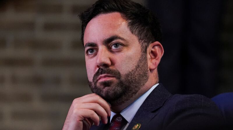 Mike Lawler listens as Joe Biden delivers remarks at SUNY Westchester Community College Valhalla in Valhalla, New York.