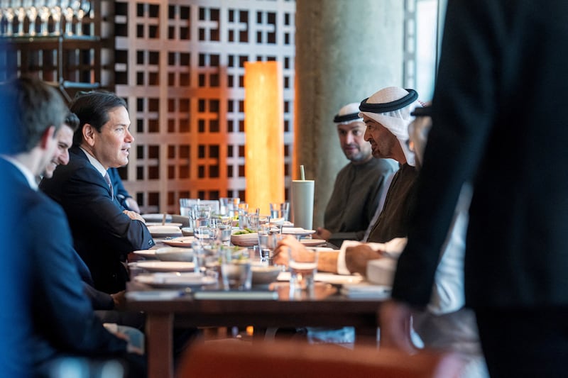 Sheikh Mohamed bin Zayed Al Nahyan, President of the United Arab Emirates, and Marco Rubio, Secretary of State of of the United States of America, meet at Zuma restaurant, at Al Maryah Island, Abu Dhabi, United Arab Emirates, June 24, 2026.   Abdulla Al Neyadi / UAE Presidential Court/Handout via REUTERS    THIS IMAGE HAS BEEN SUPPLIED BY A THIRD PARTY