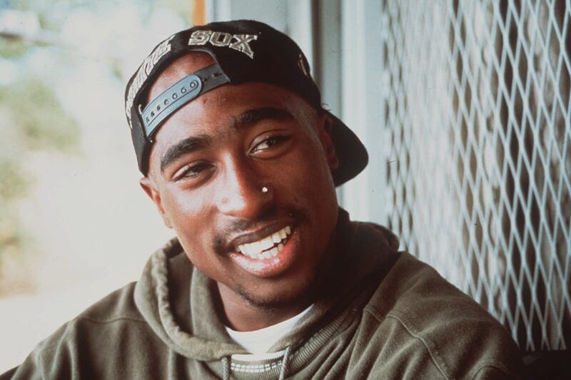 galleries/2012/04/23/tupac-shakur-elvis-presley-and-more-dead-celebrities-rumored-to-be-alive-photos/dead-celebrities-rumored-alive-tupac-shakur_gwkfrs