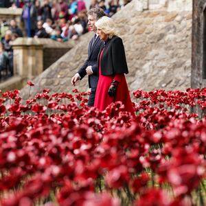 Britain's Queen Camilla visits the ceramic poppies installation at the Tower of London on May 6, 2025 to celebrate the 80th anniversary of VE Day also known as Victory in Europe Day, marking the end of the Second World War in Europe.