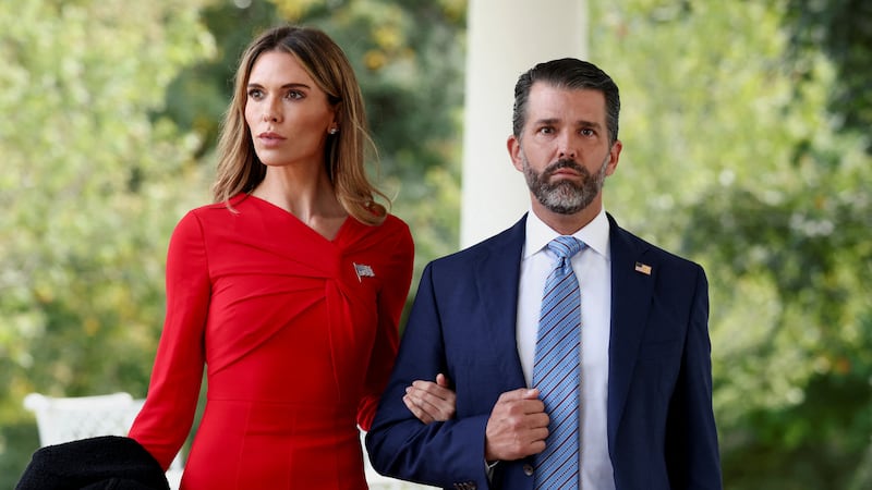 Donald Trump Jr. and Bettina Anderson attend a ceremony held by U.S. President Donald Trump to award posthumously the Medal of Freedom to Charlie Kirk in the Rose Garden at the White House in Washington, D.C., U.S., October 14, 2025. REUTERS/Kevin Lamarque