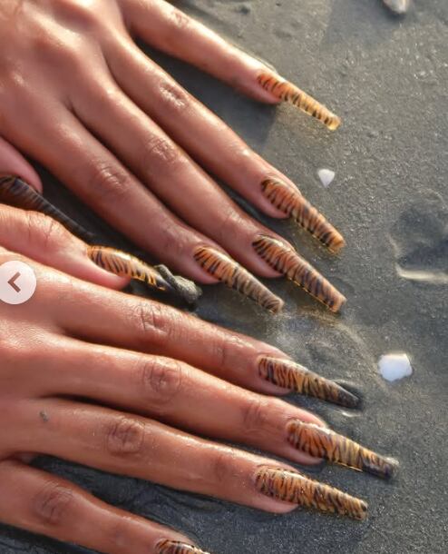 Tiger print manicure spotted on Megan Thee Stallion’s Instagram.