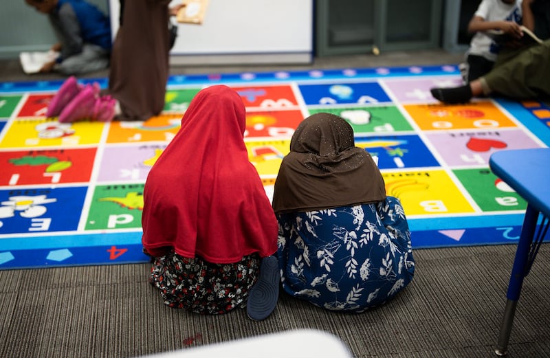 MINNEAPOLIS, MN. - DECEMBER 2025: Children read at ABC Learning Center Inc. in Minneapolis, Minn., on Tuesday, December 30, 2025.  A viral video showed a YouTubers knocking on doors of Somali run daycares and claiming there were no children there, accusing the owners of defrauding the state. This daycare was featured in the video but did not allow the Youtuber in to the building. (Photo by Renee Jones Schneider/The Minnesota Star Tribune via Getty Images)