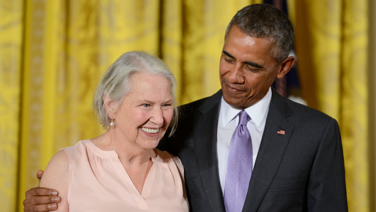WASHINGTON, DC - SEPTEMBER 10: President Barack Obama presents author Annie Dillard with the 2014 National Humanities Medal at The White House on September 10, 2015 in Washington, DC. (Photo by Leigh Vogel/WireImage)