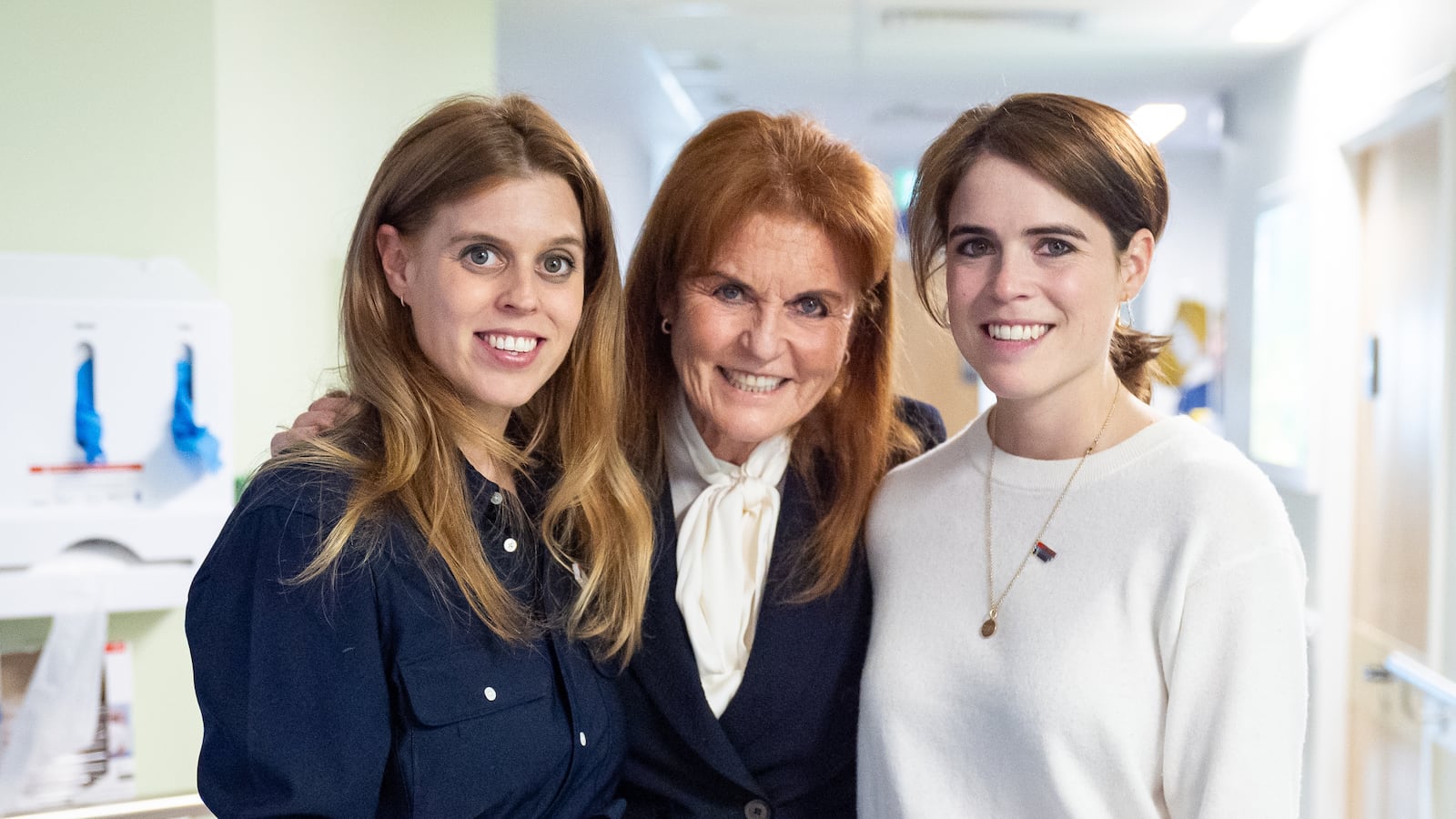 Sarah, Duchess of York with her daughters Princess Beatrice and Princess Eugenie during a visit to the Teenage Cancer Trust unit at University College Hospital, London. Picture date: Wednesday April 23, 2025. (Photo by Aaron Chown/PA Images via Getty Images)