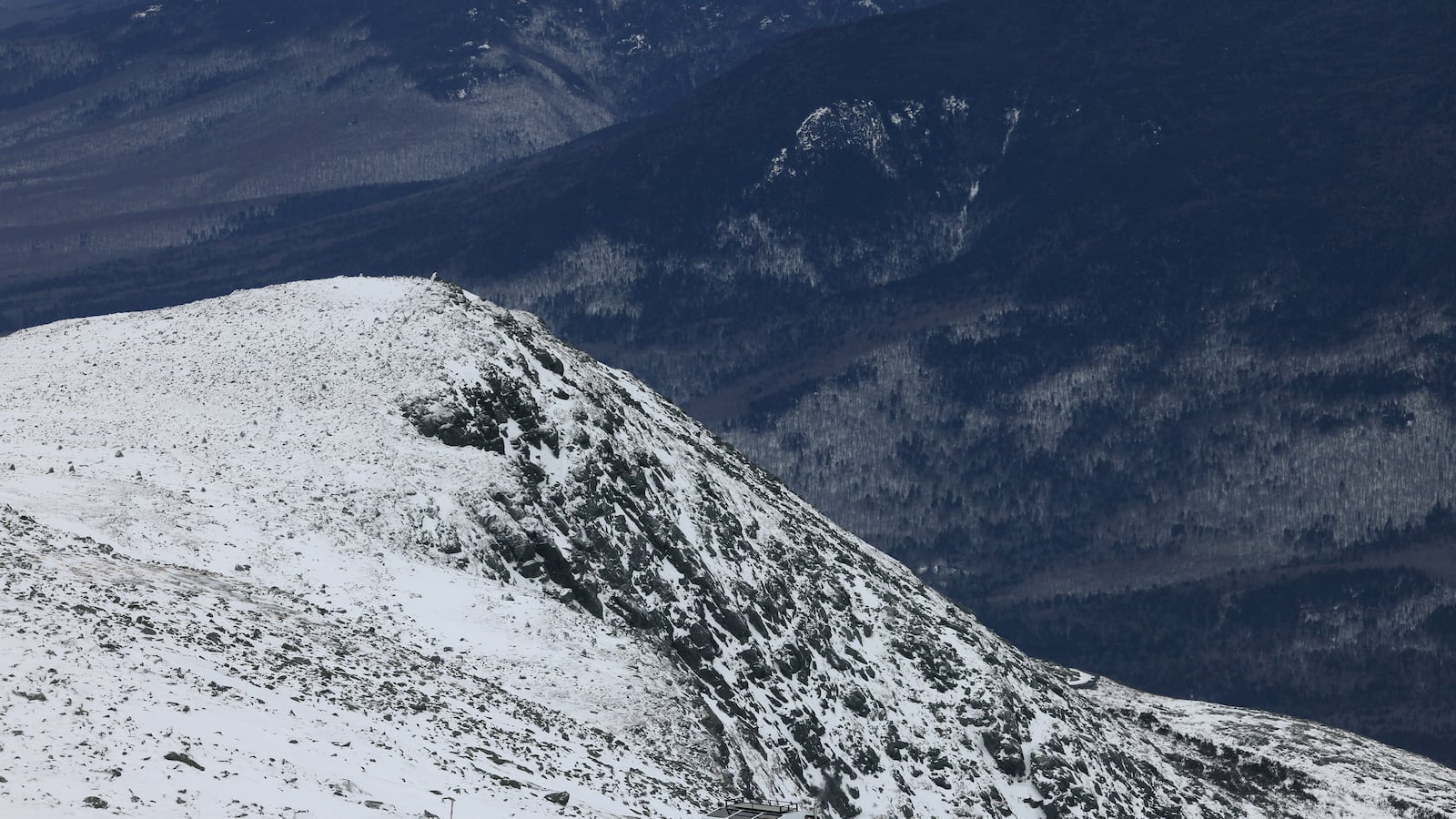 A snow cat in part of the snowy White Mountains in winter in New Hampshire.