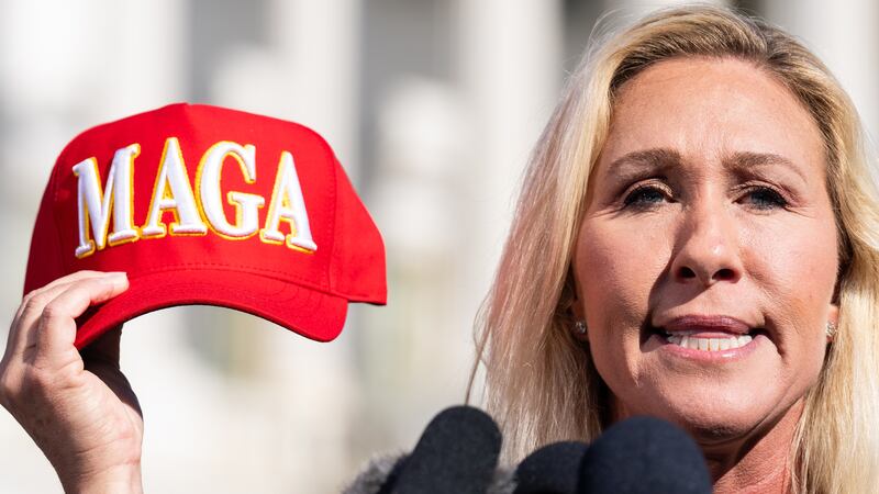 WASHINGTON - MAY 1: Rep. Marjorie Taylor Greene, R-Ga., holds her "Make America Great Again" hat during the news conference outside the U.S. Capitol on Wednesday, May 1, 2024, announcing she will move forward next week on the motion to vacate Speaker Mike Johnson.