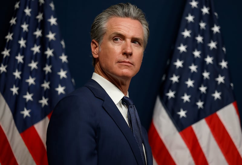 SACRAMENTO, CALIFORNIA - AUGUST 21: California Gov. Gavin Newsom looks on during a bill signing event related to redrawing the state’s congressional maps on August 21, 2025 in Sacramento, California. In a move to counter Texas House Republicans’ plan to redraw the state’s congressional maps ahead of the 2026 midterm elections, California Democrats took up a proposed constitutional amendment to temporarily redraw their own congressional maps, potentially creating five additional U.S. House seats for their party.