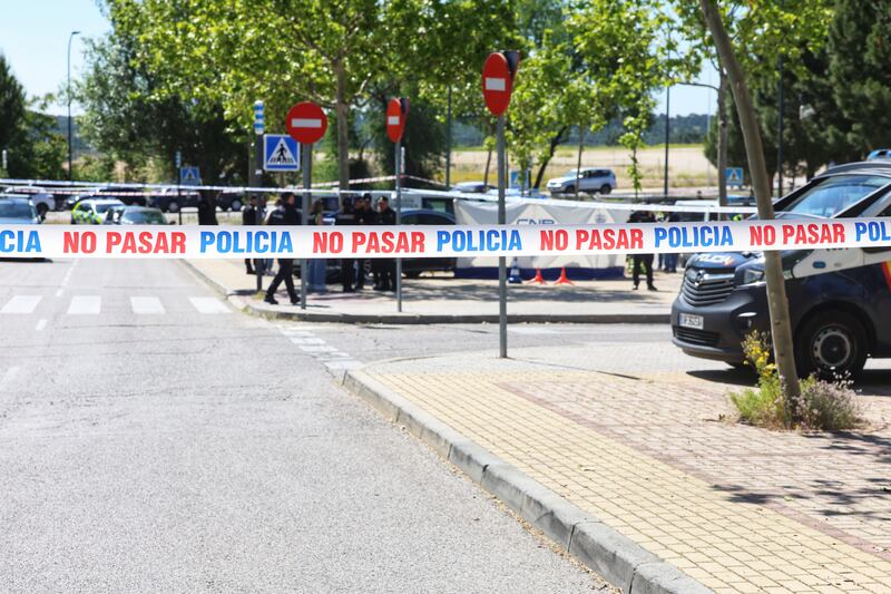 Scientific Police officers at the scene of the incident.