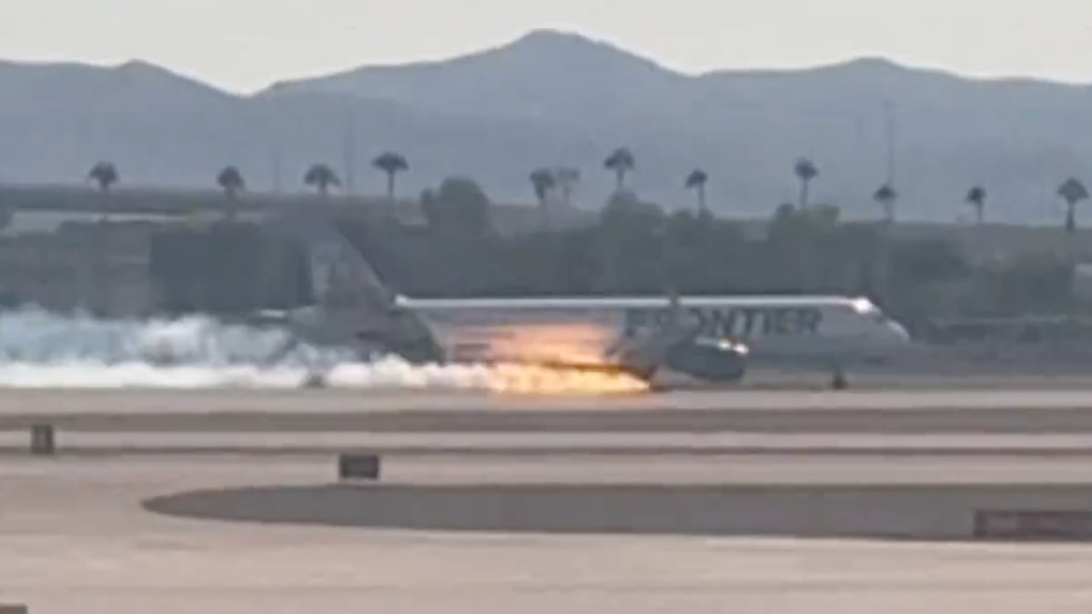 A Frontier Airlines jet was engulfed in flames during an emergency landing in Las Vegas.