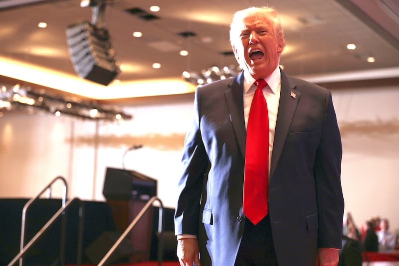 President Donald Trump departs from the stage after delivering remarks during an event at Mount Airy Casino Resort on December 9, 2025 in Mount Pocono, Pennsylvania.