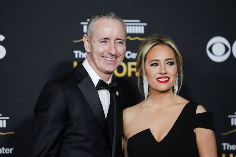 U.S. Representative Brian Fitzpatrick (R-PA) and journalist Jacqui Heinrich pose on the red carpet for the 2025 Kennedy Center Honors at the John F. Kennedy Center for the Performing Arts in Washington, D.C., U.S., December 7, 2025.