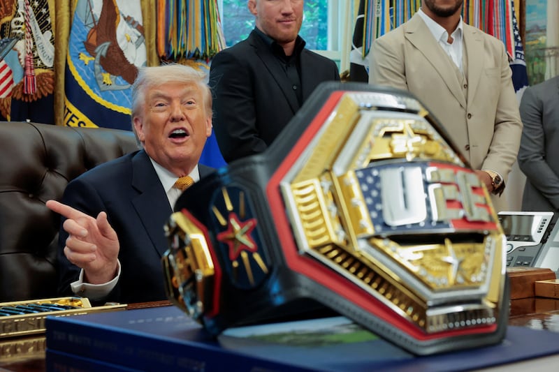 The UFC Belt lies on the table as U.S. President Donald Trump holds an event with UFC fighters in the Oval Office at the White House in Washington, D.C., U.S., May 6, 2026.
