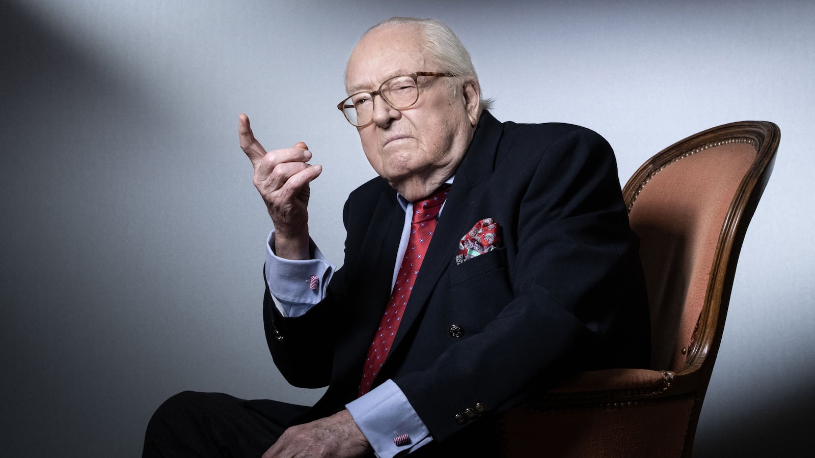 French founder of the Front National far-right party Jean-Marie Le Pen points his finger as he poses during a photo session at his home in Saint-Cloud on January 14, 2021.
