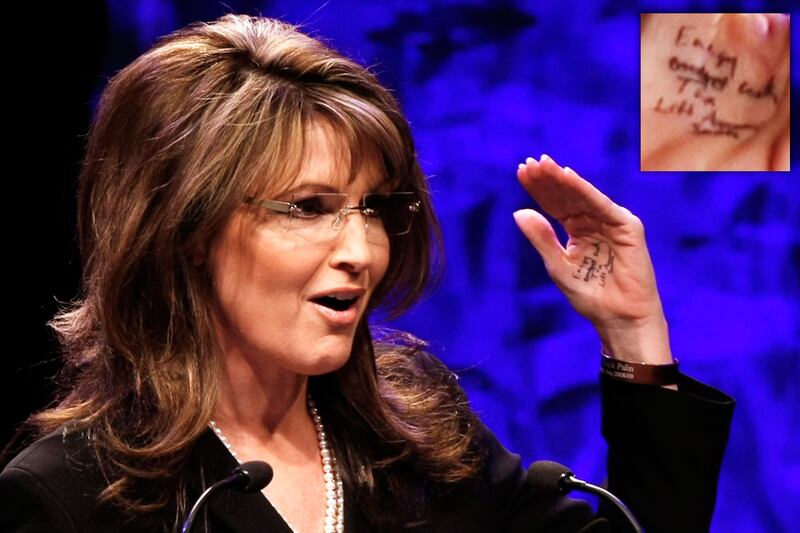 galleries/2012/10/05/romney-s-hanky-more-debate-cheating-conspiracy-theories-photos/GAL-pol-cheats-palin-cheat_zrbgrr