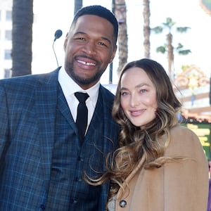 Michael Strahan poses with girlfriend Kaya Quick for his Walk of Fame star ceremony.