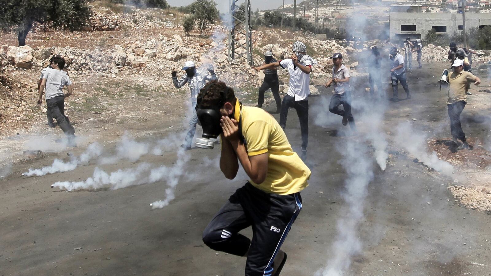 articles/2014/07/07/israelis-and-arabs-shaken-by-the-aftershock-of-teen-murders/140707-frum-israel-palestine-tease_h2t1yt