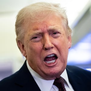 IN FLIGHT - MARCH 15: U.S. President Donald Trump speaks to members of the media onboard Air Force One on March 15, 2026 while en route to Joint Base Andrews, Maryland from West Palm Beach Florida. President Trump returned to Washington D.C. on Sunday following a weekend trip to Florida. (Photo by Nathan Howard/Getty Images)