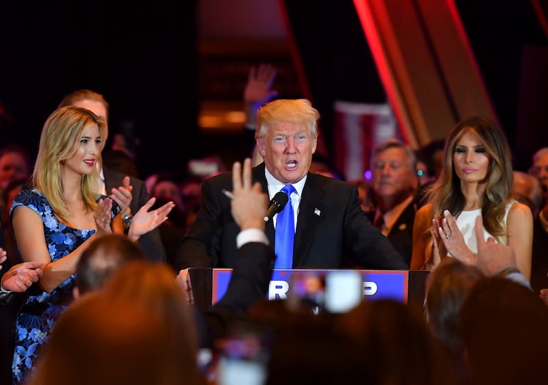 Surrounded by his supporters and family, Republican presidential candidate Donald Trump addresses the media at Trump Tower following primary election results on May 3, 2016, in New York, NY.