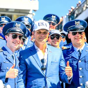 Secretary of War Pete Hegseth poses for a photo with cadets