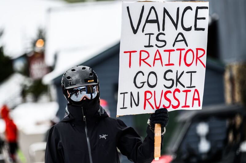 Demonstrator holds an anti-JD Vance sign at Sugarbush Ski Area in Warren, VT, where the US vice-president came to ski with his family. (Photo by: John Lazenby/UCG/Universal Images Group via Getty Images)
