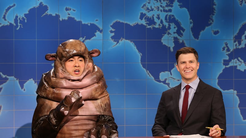 Bowen Yang as Moo Dang the hippo and Colin Jost during Weekend Update on Saturday