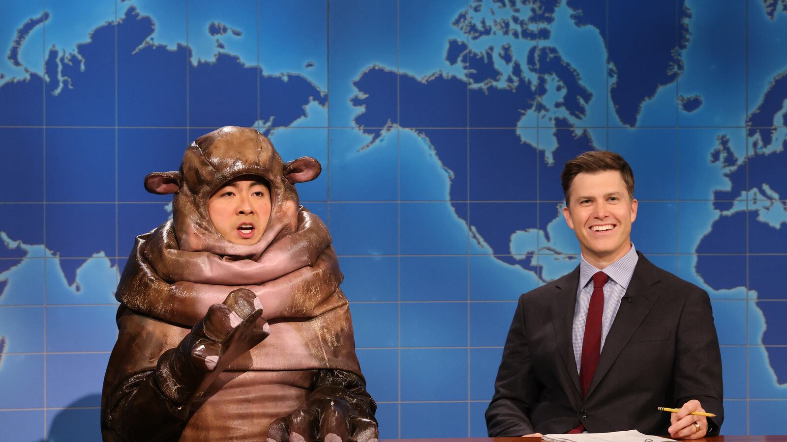Bowen Yang as Moo Dang the hippo and Colin Jost during Weekend Update on Saturday